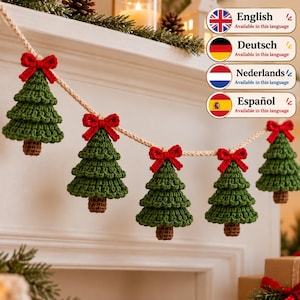 May include: A crocheted garland featuring five green Christmas trees with brown trunks, each topped with a small red bow. The trees are attached to a thick, cream-colored braided cord. The design is consistent across all five tree ornaments.