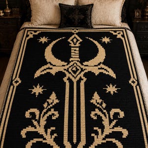 May include: A rectangular crochet blanket featuring a black background with a large, centred beige sword design. The sword is flanked by symmetrical beige floral motifs and star shapes, all enclosed within a decorative geometric border.