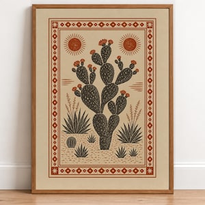 May include: A framed wall art print featuring a central prickly pear cactus with orange flowers, surrounded by smaller desert plants and two suns. The illustration is enclosed in a geometric border with diamond and star patterns on a tan background.