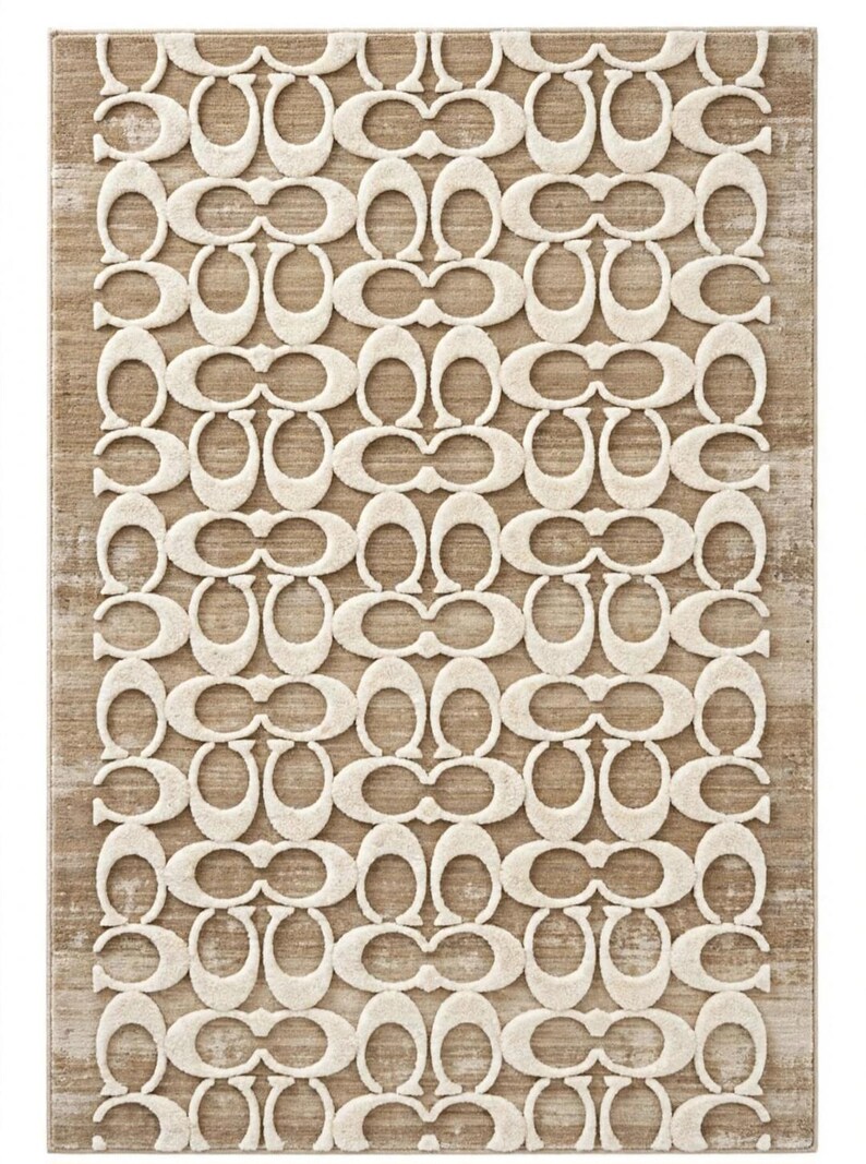 May include: A rectangular area rug featuring a repeating cream-colored C-shaped logo pattern set against a textured tan background. The design consists of interlocking letter motifs arranged in a grid, creating a high-contrast visual effect.