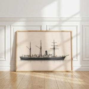 May include: A framed horizontal print featuring a detailed technical illustration of a three-masted steamship. The vessel is rendered in black and white tones against a light beige background, showcasing masts, rigging, and a central smokestack.