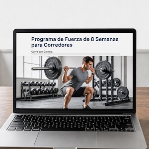 May include: A silver laptop displaying a digital document titled "Programa de Fuerza de 8 Semanas para Corredores" and "Corre con Ciencia" above an image of a person performing a barbell squat in a gym with weight racks and plates.