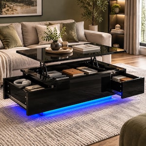 May include: A black coffee table with a lift-top mechanism, two side drawers, and integrated blue LED lighting along the base. The table features a glossy finish, with an open storage compartment containing books and white headphones.