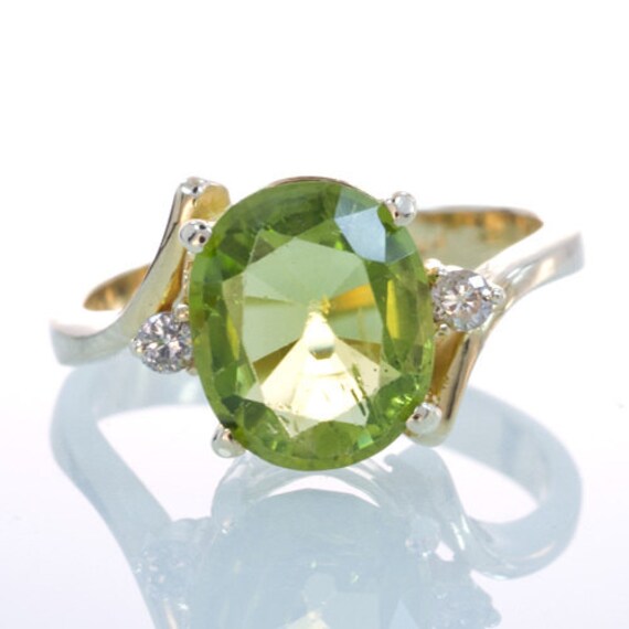 Items similar to 14K Gold Solitaire Simple Peridot Ring on Etsy