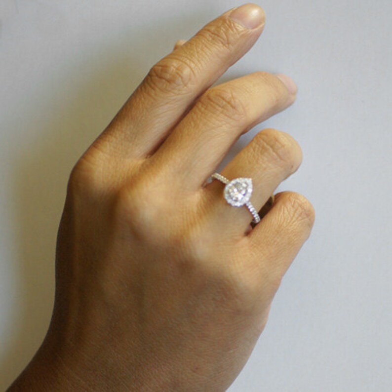 solitaire teardrop engagement ring