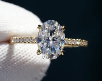 Oval cut moissanite engagement ring with diamond prongs and band (2.63ct tw - 1.8mm band)