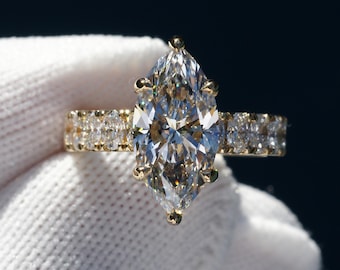 Marquise cut diamond engagement ring with hidden halo and wide oval diamond band (4.21ct tw - 3.7mm band)