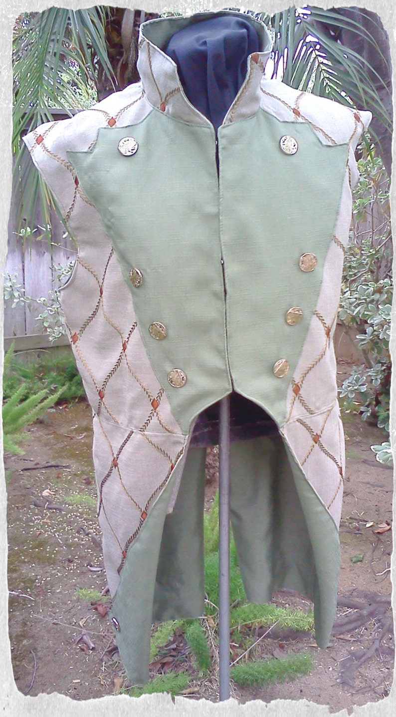 May include: A green and beige sleeveless vest with a high collar and gold buttons. The vest has a unique design with a rope pattern on the sides.