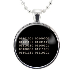May include: A silver necklace with a round pendant featuring a black background and white binary code: 01101001 00100000 01101100 01101111 01110110 01100101 00100000 01111001 01101111 011110101