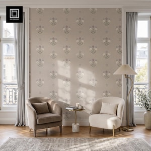 May include: A beige wallpaper featuring a repeating pattern of small, stylized floral bouquets in muted tones of blue, white, and green. The wallpaper covers a wall between two windows with light gray curtains, two armchairs, and a floor lamp.