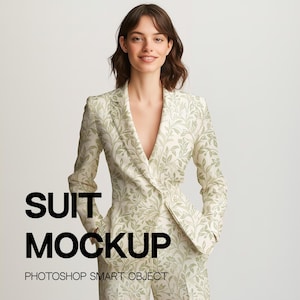 May include: A white suit with a green floral pattern. The suit features a blazer with a v-neck and long sleeves. The text "SUIT MOCKUP" and "PHOTOSHOP SMART OBJECT" is printed below the image.