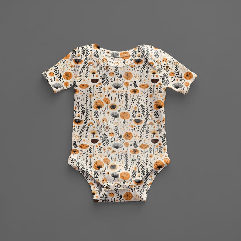 May include: A white baby onesie with a floral pattern in shades of orange, yellow, and brown. The flowers are stylized and have a vintage feel.