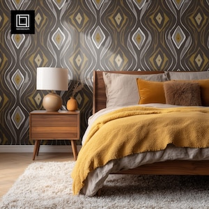 May include: A bedroom interior with a wooden bed, mustard yellow blanket, and pillows. A wooden bedside table holds a lamp and vase. The wallpaper features a repeating diamond pattern in grey, white, and gold. The room has a warm, inviting atmosphere.