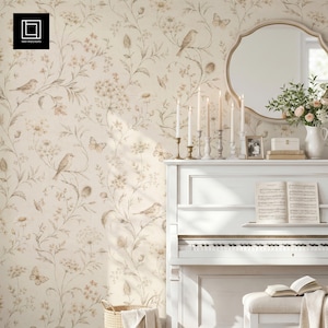 May include: Wallpaper featuring a beige background with a repeating pattern of brown birds, butterflies, and wildflowers. A white piano stands against the wall, topped with five lit candles, a round mirror, and a vase of flowers.