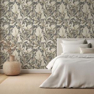 May include: A white bed with white bedding and two pillows sits in front of a wall covered in beige and brown floral wallpaper.