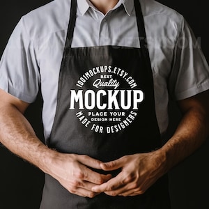 Puede incluir: Un delantal negro con un diseño circular blanco que dice "Best Quality Mockup" y "Place Your Design Here Made For Designers".
