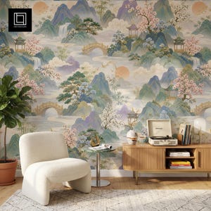 May include: A scenic wallpaper featuring a traditional Asian landscape with mountains, bridges, waterfalls, and pagodas. The color palette includes soft blues, greens, and pinks, creating a serene and artistic backdrop for interior design.