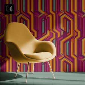 May include: A mustard-yellow armchair with thin, silver legs sits in front of a wall with a geometric pattern. The wallpaper features vertical lines in shades of purple, orange, and teal. The chair has a rounded seat and back.