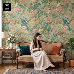 May include: Wallpaper featuring a dense jungle scene with leopards, monkeys, parrots, and tropical flowers in shades of green, pink, and orange. The pattern includes detailed illustrations of exotic wildlife and lush foliage on a soft green background.
