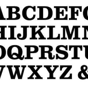 May include: Black and white alphabet letters in a bold, blocky font style. The letters are arranged in three rows, with the first row containing the letters A through G, the second row containing the letters H through N, the third row containing the letters O through U, and the fourth row containing the letters V through Z and the ampersand symbol.