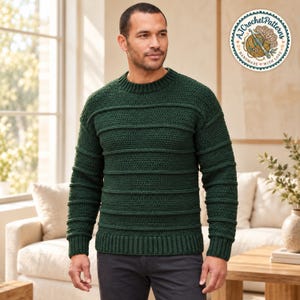 May include: A dark forest green long-sleeve jumper featuring a horizontal ribbed texture, a crew neckline, and a thick ribbed hem. The jumper is crafted with a crochet stitch pattern and includes a circular logo in the corner reading AJCrochetPatterns.