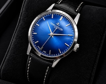 Reloj Jaeger-LeCoultre Club vintage: fabricado en Suiza, cuerda manual, esfera azul, correa de cuero.
