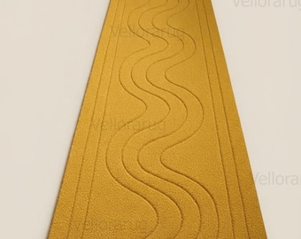May include: A long, rectangular mustard yellow runner rug featuring a textured surface with a central wavy line pattern and a solid border. The word Vellorarug is visible in faint, repeated text across the surface of the rug.