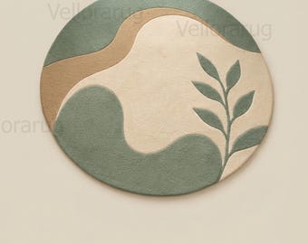 May include: A circular rug featuring an abstract design with organic shapes in sage green, beige, and tan. The surface displays a carved-out leaf motif on the right side. The text Vellorarug is visible in the background, repeating across the image.