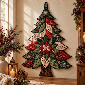 May include: A quilted wall hanging shaped like a Christmas tree, featuring layered fabric segments in shades of dark green, cream, and red. The design includes embroidered holly berries, poinsettia flowers, and plaid patterns with a brown trunk.