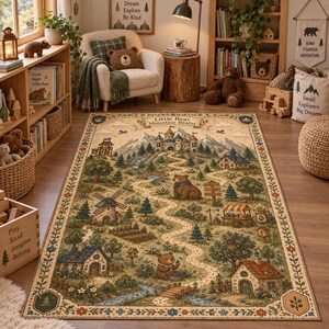 May include: A rectangular area rug featuring a detailed illustration titled Little Bear Mountain Realm. The design depicts a winding path through a forest landscape with a castle, houses, a windmill, and bears. The border has floral motifs.