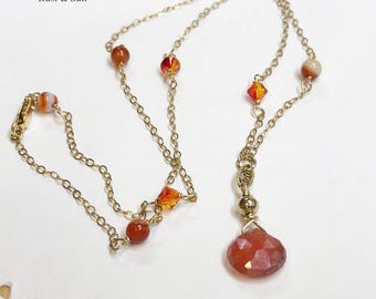 Mystic Carnelian on 14k Gold Filled Station Chain Carnelian Agate Fire Opal Swarovski Crystals. Necklace is 18" with a 1-1/8" Pendant Drop.