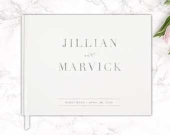 以下が含まれることがあります： 「Jillian and Marvick Guest Book - April 26, 2020」という文字が書かれた白いゲストブックです。