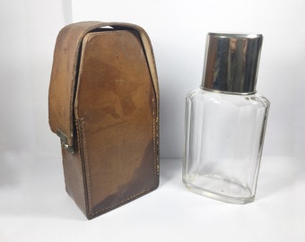 Antique large glass spirit liquor hip  flask in tan leather holder with integral toddy cup, hunting, fishing travel cup