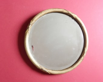 Vintage small round mirror with carved gold wooden frame Gilded circular looking glass