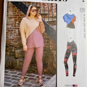 May include: McCall's sewing pattern M8244 for sizes KK (26W-28W-30W-32W). The pattern includes instructions for making a hooded top, a short-sleeved top, and leggings. The pattern is designed and printed in the USA.