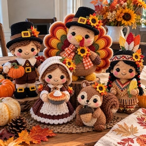 May include: A collection of five crocheted figures including a pilgrim, a turkey, a person in a bonnet holding a pie, a squirrel holding an acorn, and a person with a feathered headband holding corn, all featuring autumn-themed accents.