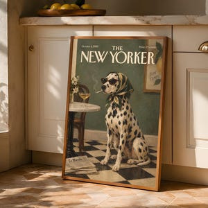 May include: A framed print of a New Yorker magazine cover dated October 6, 1980. The illustration features a Dalmatian dog wearing a headscarf and sunglasses, sitting on a black and white checkered floor next to a small table with a drink.