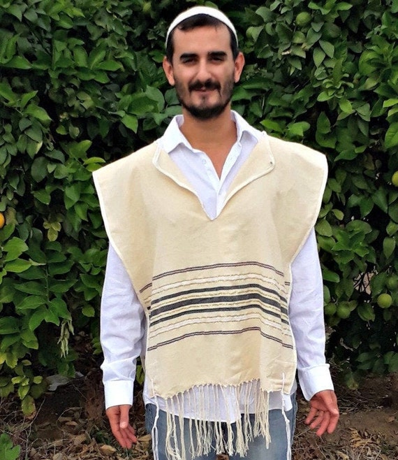 The tallit with tzitzit on the corners comes from the traditional Jewish  garment, worn kind of like a tunic, in ancient times. Today, many keep  tzitzit but attach them to a kind