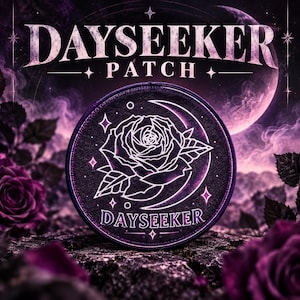 May include: A circular embroidered patch featuring a white line art design of a rose and a crescent moon on a dark purple background. The text DAYSEEKER is printed in white at the bottom of the patch. The design includes small star accents.