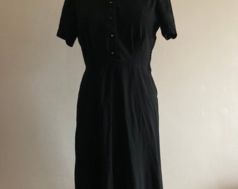 vintage 1950s black fit and flare dress