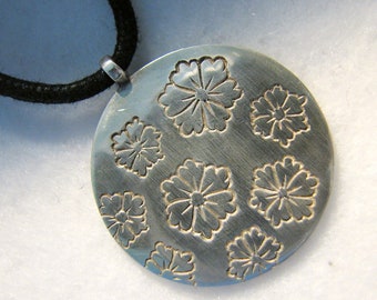 Early/Rare ME & RO Necklace -- Sterling Silver Geisha Flowers on Black Cotton Cord,  1-1/8" Diameter on 16" Cotton Cord, Excellent Condition