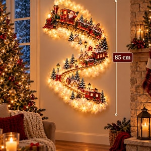 May include: A wall-mounted Christmas train decoration measuring 85 cm in height. The train features a red locomotive with Santa, passenger cars, and a winding track surrounded by illuminated white clouds, miniature pine trees, and houses.