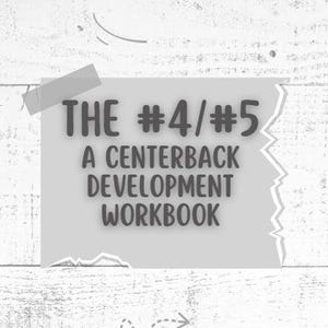 May include: A rectangular light gray paper sheet with torn edges, attached by a piece of gray tape. The text reads: THE #4/#5 A CENTERBACK DEVELOPMENT WORKBOOK. The paper is set against a white wood-grain background with subtle gray dashed lines.