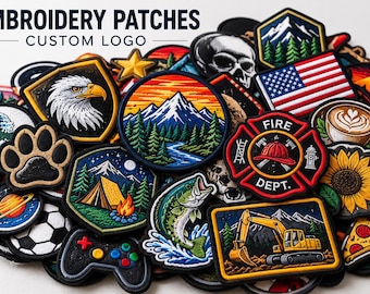 May include: A collection of colorful embroidered patches featuring diverse designs including a bald eagle, a mountain landscape, a fire department emblem, a US flag, a sunflower, a pizza slice, a game controller, and a yellow excavator.