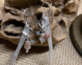 Silver drop earrings with small beaded accent