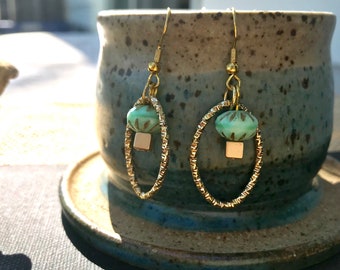 Gold oval turquoise earrings