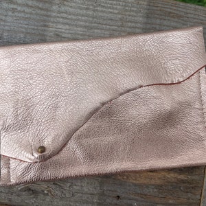 Pink Champagne leather clutch