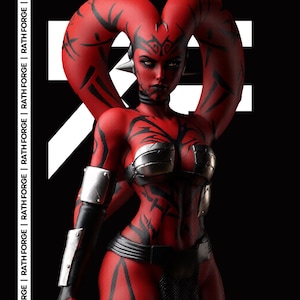 May include: A red-skinned humanoid figurine with large head-tails, black tribal markings, and silver metallic armor pieces on the chest and arms. The figure is set against a black background with white text reading RATH FORGE vertically.