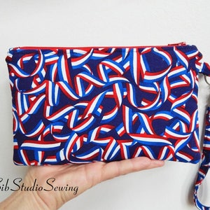 Flag Ribbon Clutch: Patriotic Phone Wristlet - Fits iPhone 15 Pro & Phone up to  7&quot; Length, 9 x 5.5 inches, Pockets
