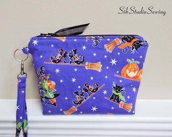 Halloween Phone Wristlet, 8.5 x 6 x 2 " , Fits iPhone 15 Pro, Plus Smartphones up to 7" Length, Interior Pockets, Halloween Wristlet